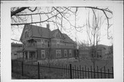 347 W MAIN ST, a Queen Anne house, built in Evansville, Wisconsin in 1855.