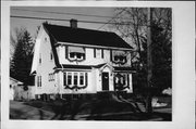 841 E CENTERWAY, a Dutch Colonial Revival house, built in Janesville, Wisconsin in 1930.