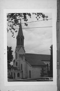 301 S CHERRY ST, a Romanesque Revival church, built in Janesville, Wisconsin in 1864.