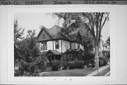 121 E HOLMES ST, a Queen Anne house, built in Janesville, Wisconsin in 1885.