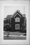203 JEFFERSON AVE, a Queen Anne house, built in Janesville, Wisconsin in 1891.