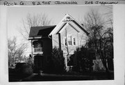 203 JEFFERSON AVE, a Queen Anne house, built in Janesville, Wisconsin in 1891.