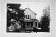 702 LOGAN ST, a Queen Anne house, built in Janesville, Wisconsin in 1895.