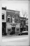 15 N MAIN ST, a Italianate retail building, built in Janesville, Wisconsin in 1865.