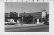 500 E MAIN ST, a Twentieth Century Commercial automobile showroom, built in Stoughton, Wisconsin in 1916.
