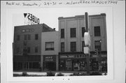 29-31 W MILWAUKEE ST, a Commercial Vernacular large retail building, built in Janesville, Wisconsin in 1880.