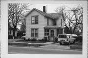 318 W RACINE ST, a Cross Gabled house, built in Janesville, Wisconsin in 1895.