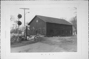 NW CORNER OF GOLDEN LANE AND ELM, MERCHANT ROW, a Astylistic Utilitarian Building depot, built in Milton, Wisconsin in 1900.