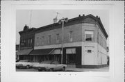 228-230 MERCHANT ROW, a Commercial Vernacular retail building, built in Milton, Wisconsin in 1897.