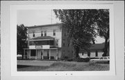 N RAILROAD ST, a Commercial Vernacular lodging-hotel, built in Bruce, Wisconsin in 1902.