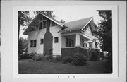 GERMAN ST AND GRAND, a Craftsman house, built in Hawkins, Wisconsin in 1923.