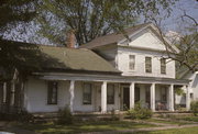 455 6TH, a Greek Revival house, built in Prairie du Sac, Wisconsin in 1842.