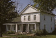 455 6TH, a Greek Revival house, built in Prairie du Sac, Wisconsin in 1842.