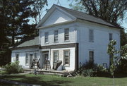 455 6TH, a Greek Revival house, built in Prairie du Sac, Wisconsin in 1842.