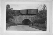 Wisconsin & Southern RR over Goette Rd, a NA (unknown or not a building) stone arch bridge, built in Merrimac, Wisconsin in 1878.