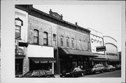 115-117-119 3RD ST, a Italianate large retail building, built in Baraboo, Wisconsin in 1886.