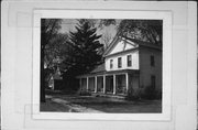 455 6TH, a Greek Revival house, built in Prairie du Sac, Wisconsin in 1842.