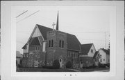 SE CORNER OF BROADWAY AND PARK ST, a English Revival Styles church, built in Rock Springs, Wisconsin in 1930.