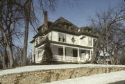 209 ORANGE ST, a Colonial Revival/Georgian Revival house, built in Hudson, Wisconsin in 1900.