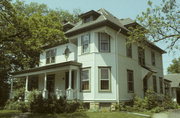 209 ORANGE ST, a Colonial Revival/Georgian Revival house, built in Hudson, Wisconsin in 1900.