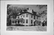 209 ORANGE ST, a Colonial Revival/Georgian Revival house, built in Hudson, Wisconsin in 1900.