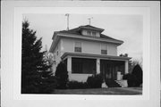 311 N GREEN AVE, a American Foursquare house, built in New Richmond, Wisconsin in 1916.
