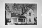 231 HIGH ST, a Gabled Ell house, built in New Richmond, Wisconsin in 1900.