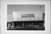 127 S KNOWLES AVE, a Commercial Vernacular retail building, built in New Richmond, Wisconsin in 1918.