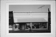 155 S KNOWLES AVE, a Commercial Vernacular retail building, built in New Richmond, Wisconsin in 1900.