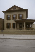 822 NIAGARA AVE, a Greek Revival house, built in Sheboygan, Wisconsin in 1856.