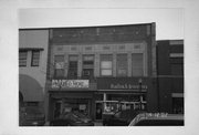 919-923 N 8TH, a Commercial Vernacular retail building, built in Sheboygan, Wisconsin in 1927.