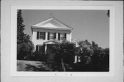 414 Erie Ave, a Greek Revival house, built in Sheboygan, Wisconsin in 1876.