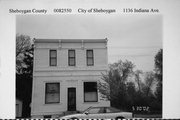 1136 Indiana Ave and 1027-1029 S 12th St, a Italianate boarding house, built in Sheboygan, Wisconsin in 1890.