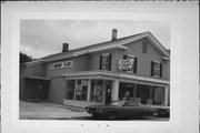 215 PINE ST, a Greek Revival retail building, built in Sheboygan Falls, Wisconsin in 1850.