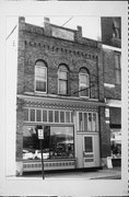 112 E GALE AVE 112 E GALE AVE, a Romanesque Revival small retail building, built in Galesville, Wisconsin in 1902.
