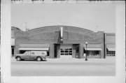 213 S MAIN ST, a Twentieth Century Commercial automobile showroom, built in Viroqua, Wisconsin in 1919.