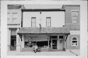 112 S MAIN ST, a Boomtown retail building, built in Westby, Wisconsin in 1880.