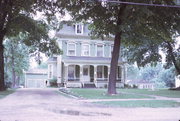243 N MARTIN ST, a Second Empire house, built in Sharon, Wisconsin in 1875.