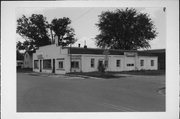 401 N WISCONSIN ST, a Astylistic Utilitarian Building automobile showroom, built in Elkhorn, Wisconsin in 1923.