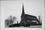 148 E MAIN ST, a Late Gothic Revival house of worship, built in Lake Geneva, Wisconsin in 1892.