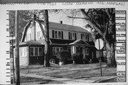 406 MAXWELL ST, a Dutch Colonial Revival house, built in Lake Geneva, Wisconsin in 1930.