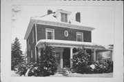 1033 WISCONSIN ST, a Colonial Revival/Georgian Revival house, built in Lake Geneva, Wisconsin in 1901.