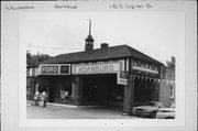 130 E CAPITOL DRIVE, a Commercial Vernacular automobile showroom, built in Hartland, Wisconsin in .