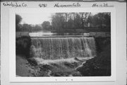 ON MENOMONEE RIVER NEAR MAIN ST AND WATER ST INTERSECTION, a NA (unknown or not a building) dam/lock, built in Menomonee Falls, Wisconsin in 1954.