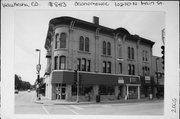 102-110 N MAIN ST, a Italianate small retail building, built in Oconomowoc, Wisconsin in 1871.