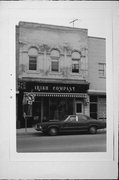 124 N MAIN ST, a Italianate small retail building, built in Oconomowoc, Wisconsin in 1890.