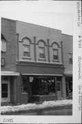 124 N MAIN ST, a Italianate small retail building, built in Oconomowoc, Wisconsin in 1890.