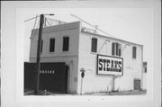 131 S SILVER LAKE ST, a Commercial Vernacular large retail building, built in Oconomowoc, Wisconsin in 1895.