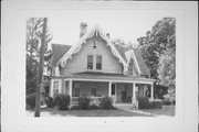 414 S SILVER LAKE ST, a Early Gothic Revival house, built in Oconomowoc, Wisconsin in 1856.