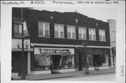 145-149 E WISCONSIN AVE, a Commercial Vernacular large retail building, built in Oconomowoc, Wisconsin in 1915.